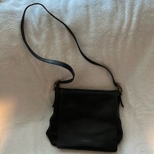 10x11x3.5. Soft leather pocket with snap on outside -zipper pocket + 2 pockets